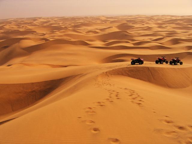 Take a quad bike across the dunes