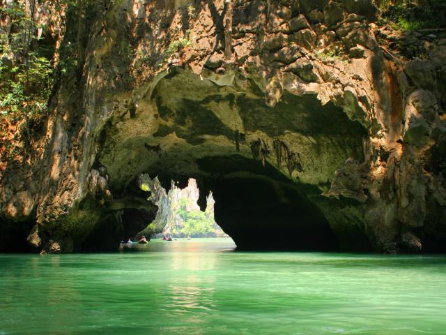 Kayak through mysterious sea caves