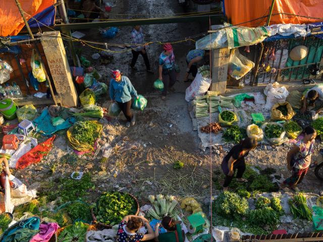 Photograph market life at dawn