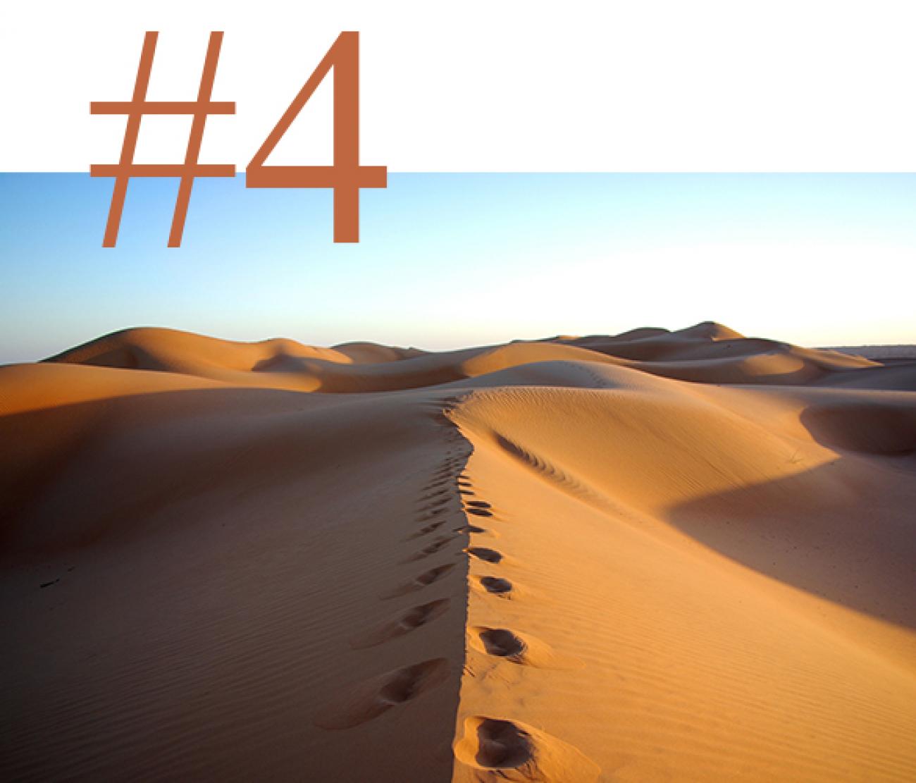 Walking along the sand dunes of Oman in February 