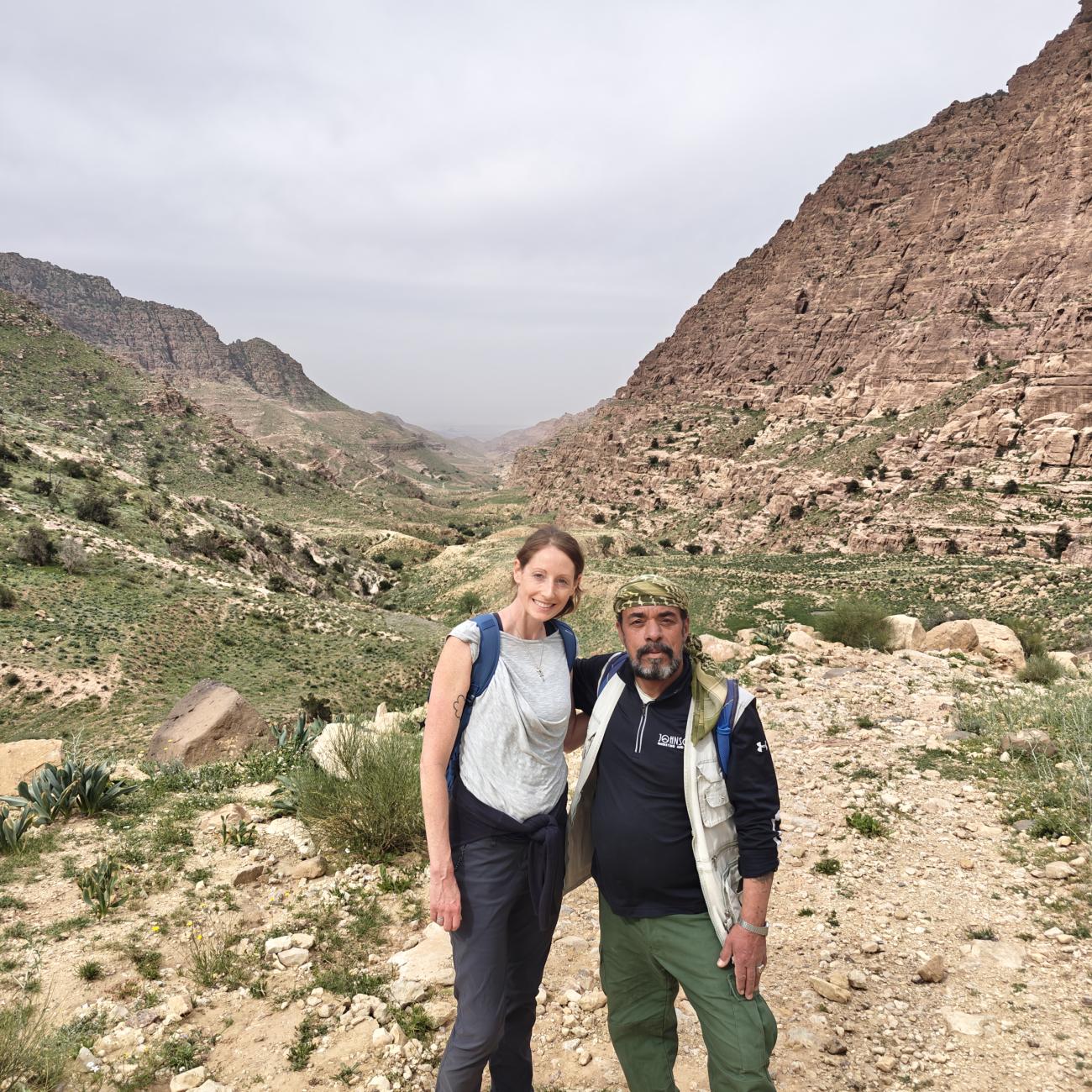 Man and woman stood in a Jordanian valley