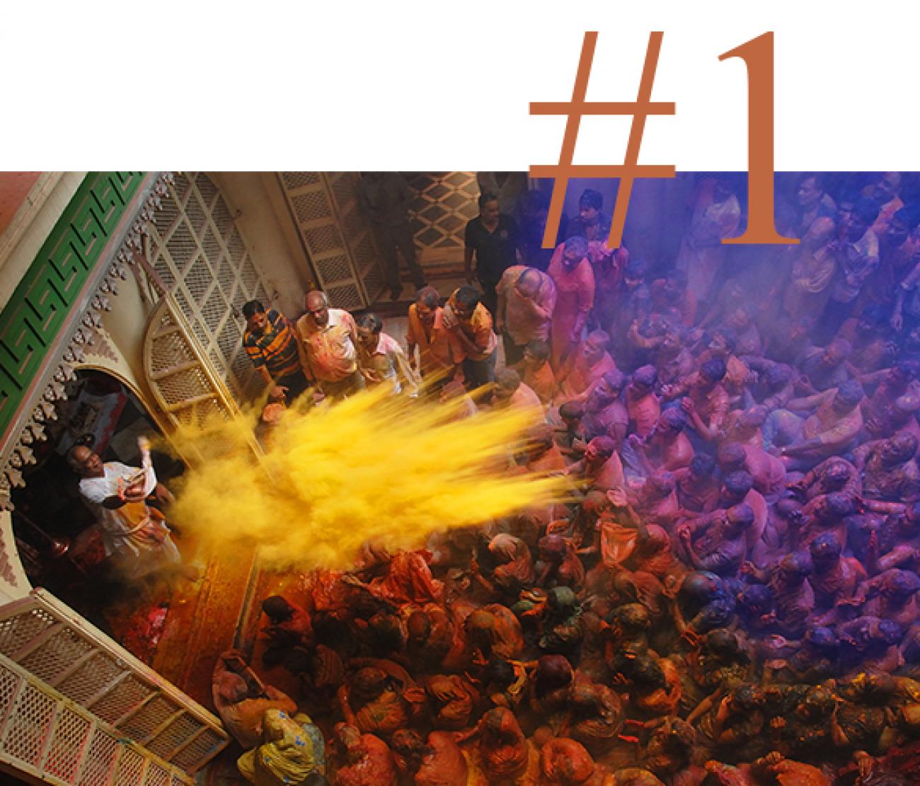 Holi Festival in India, colour is thrown over the crowds in March